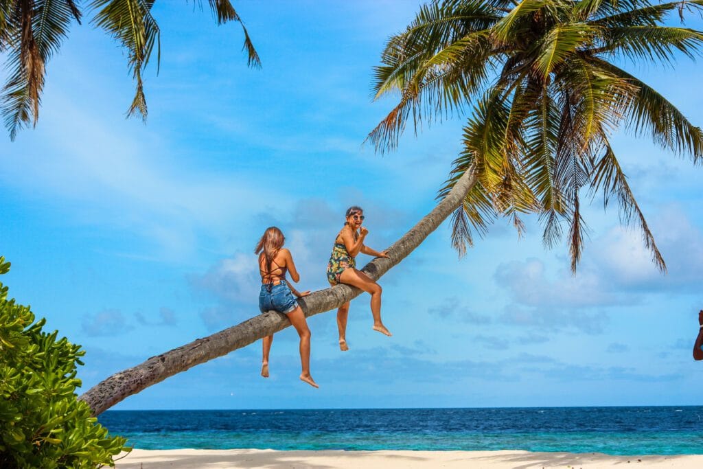 Guest enjoying beach at the best guest house in Maldives.