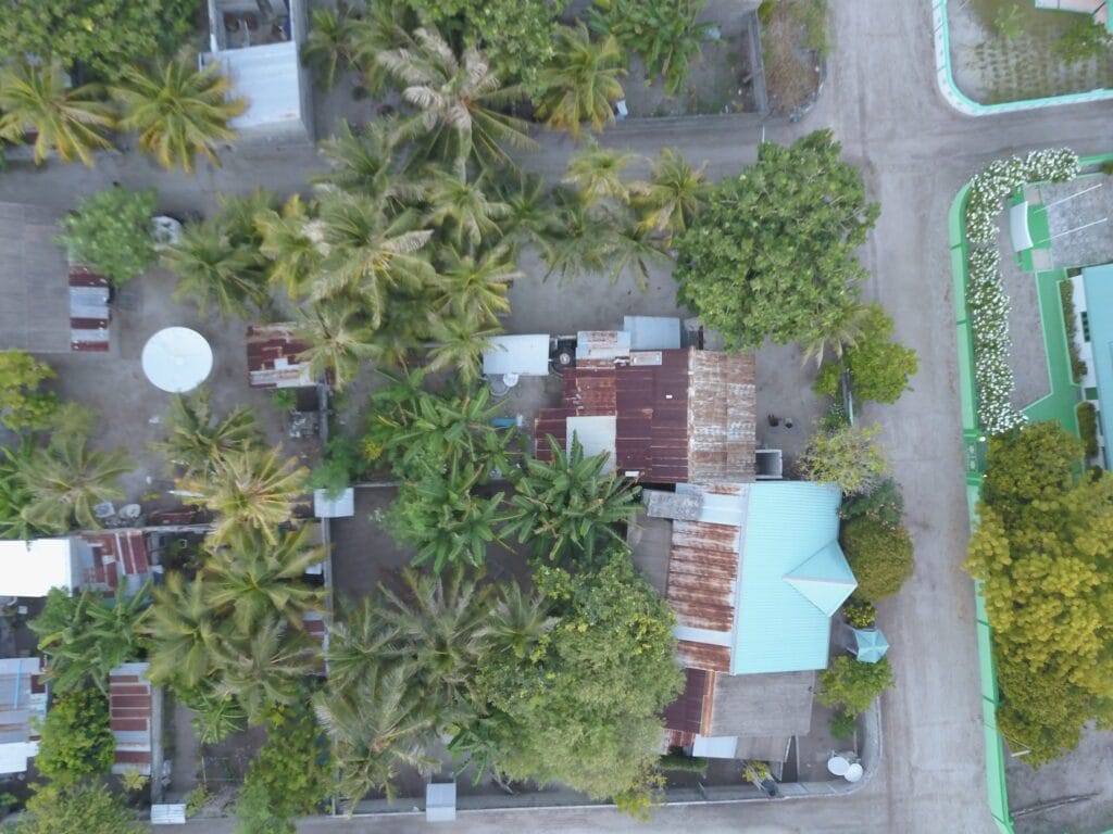 Traditional Maldivian village on Fodhdhoo Island, where tourists can experience authentic local culture.