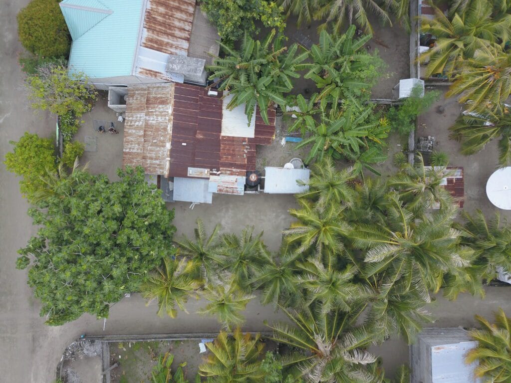 Traditional Maldivian village on Fodhdhoo Island, where tourists can experience authentic local culture.