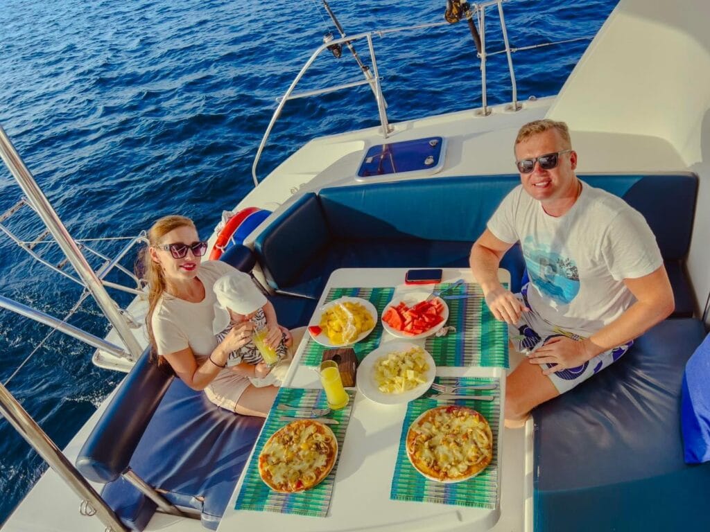 Romantic dinner setup on the Sabba White Sand Catamaran, ideal for couples looking for a unique dining experience in the Maldives.