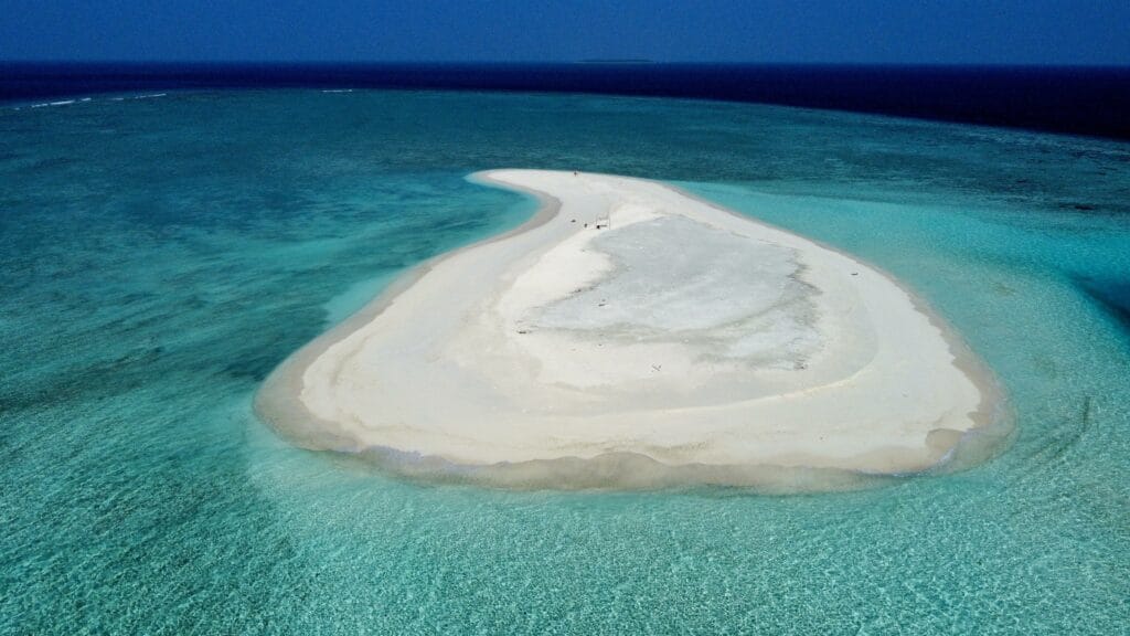 Aerial view of the secluded sandbank near Fodhdhoo, Maldives.