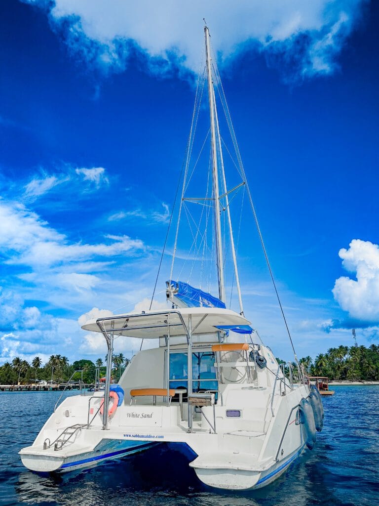 Elegant dining area inside the Sabba White Sand Catamaran, perfect for private dinners on the water.