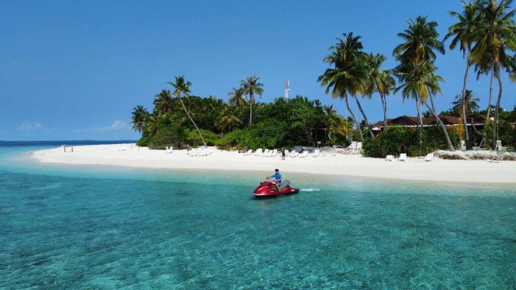 A guest getting ready for a jetski adventure at Fodhdhoo Island