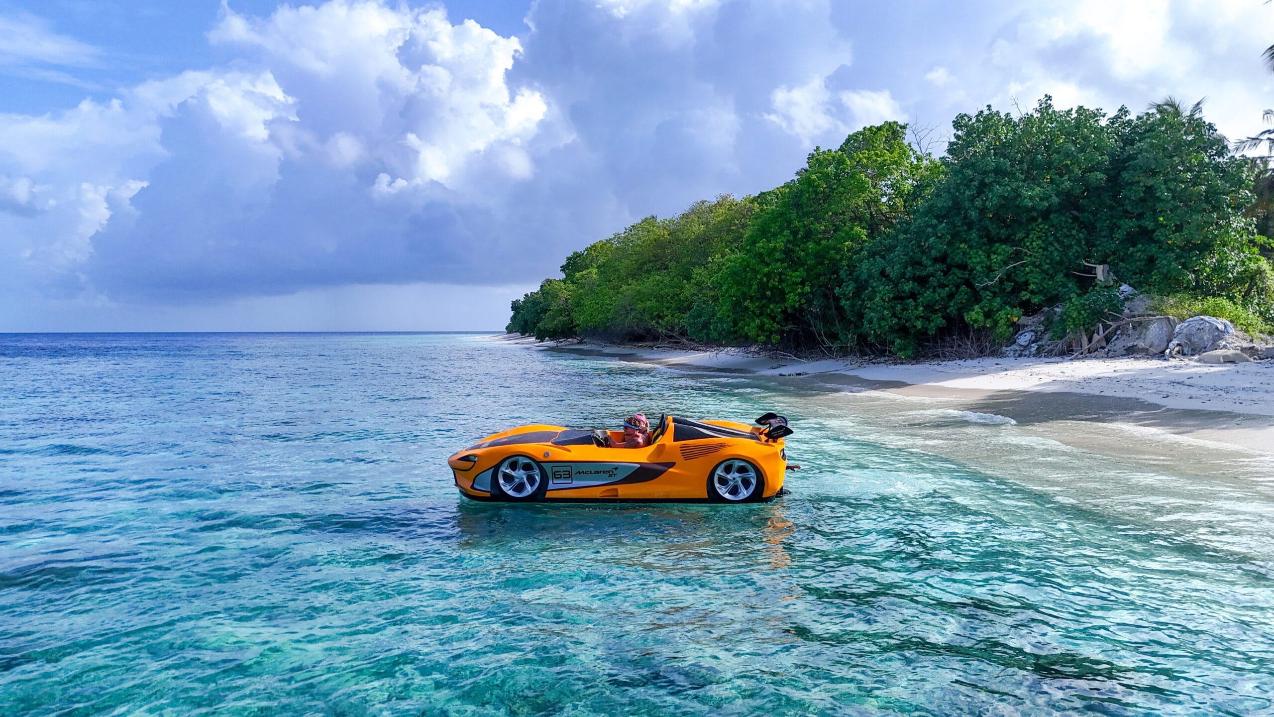 Thrill-seeking guest launching a jet-car ride, kicking off unforgettable Holidays to the Maldives